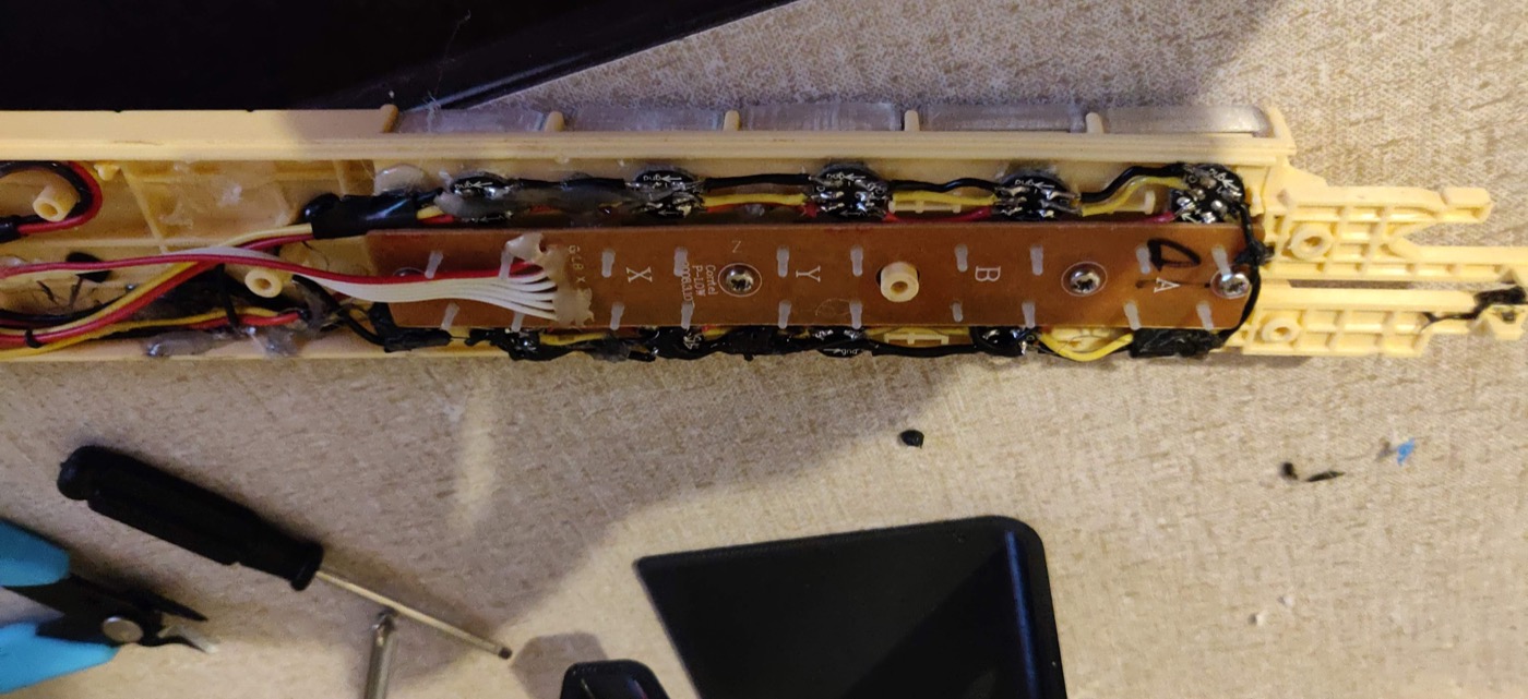LEDs and wiring inside the converted Rock Band guitar's neck